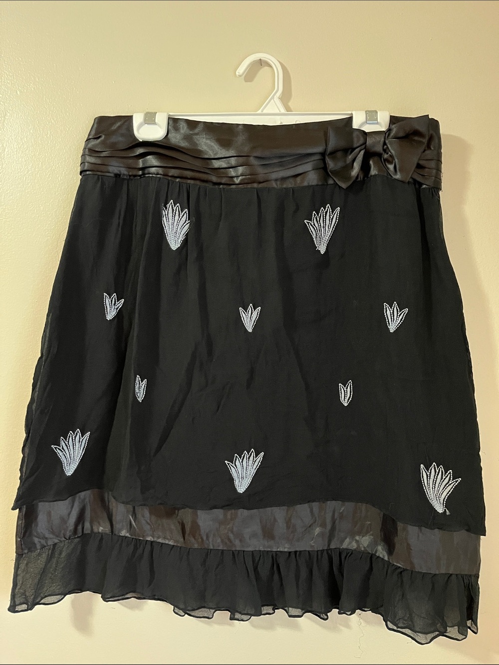 Black A-Line Skirt with Satin Waistband and White Embroidered Accents
